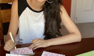 Nina writing cards